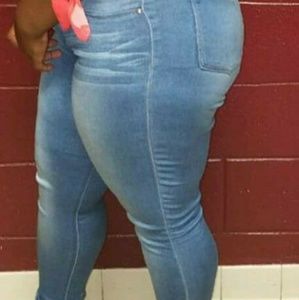 Faded denim blue jeans